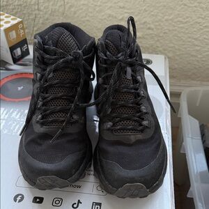 Womens Black Merrell mid length hiking sneakers